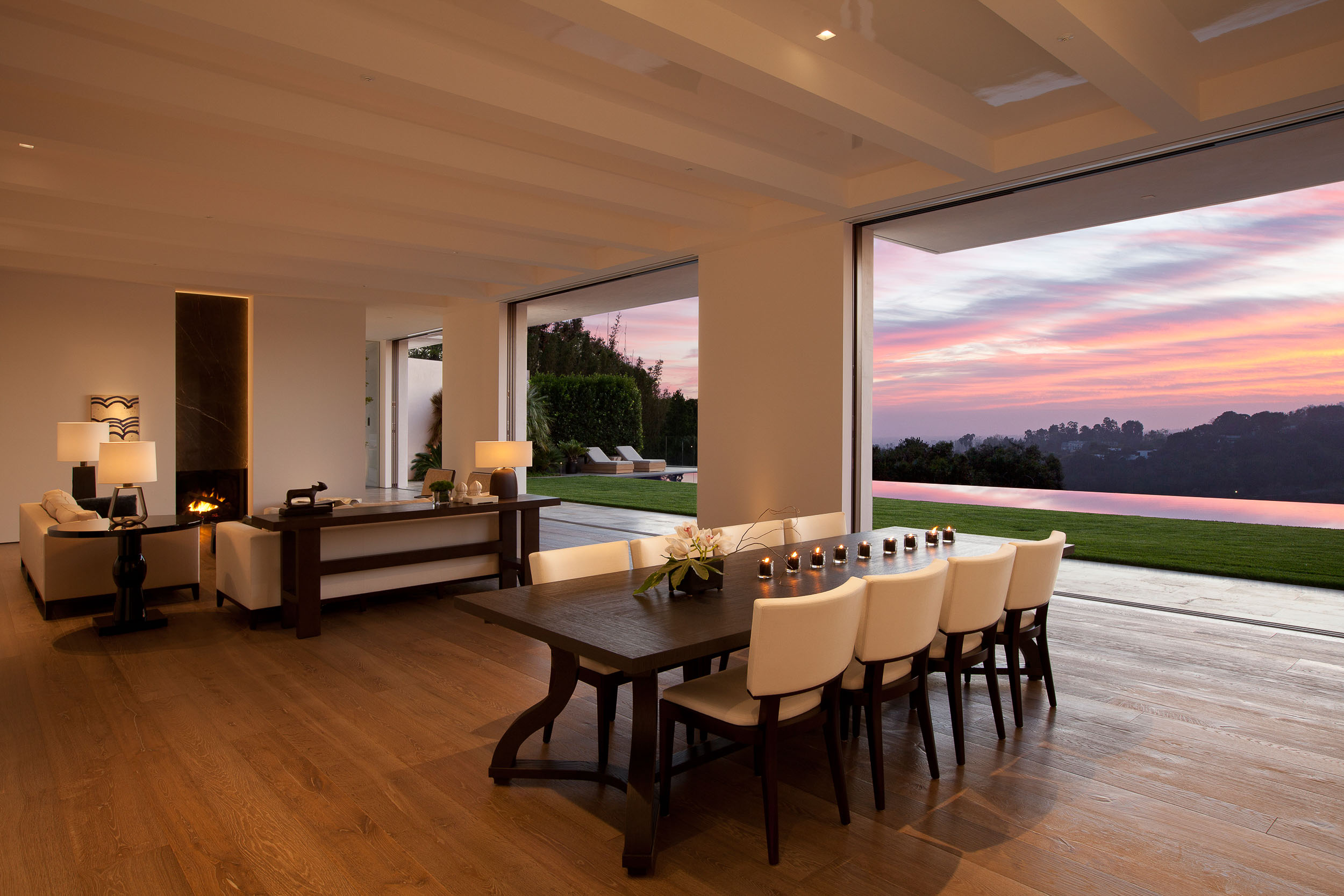 living room with open walls overlooking sunset