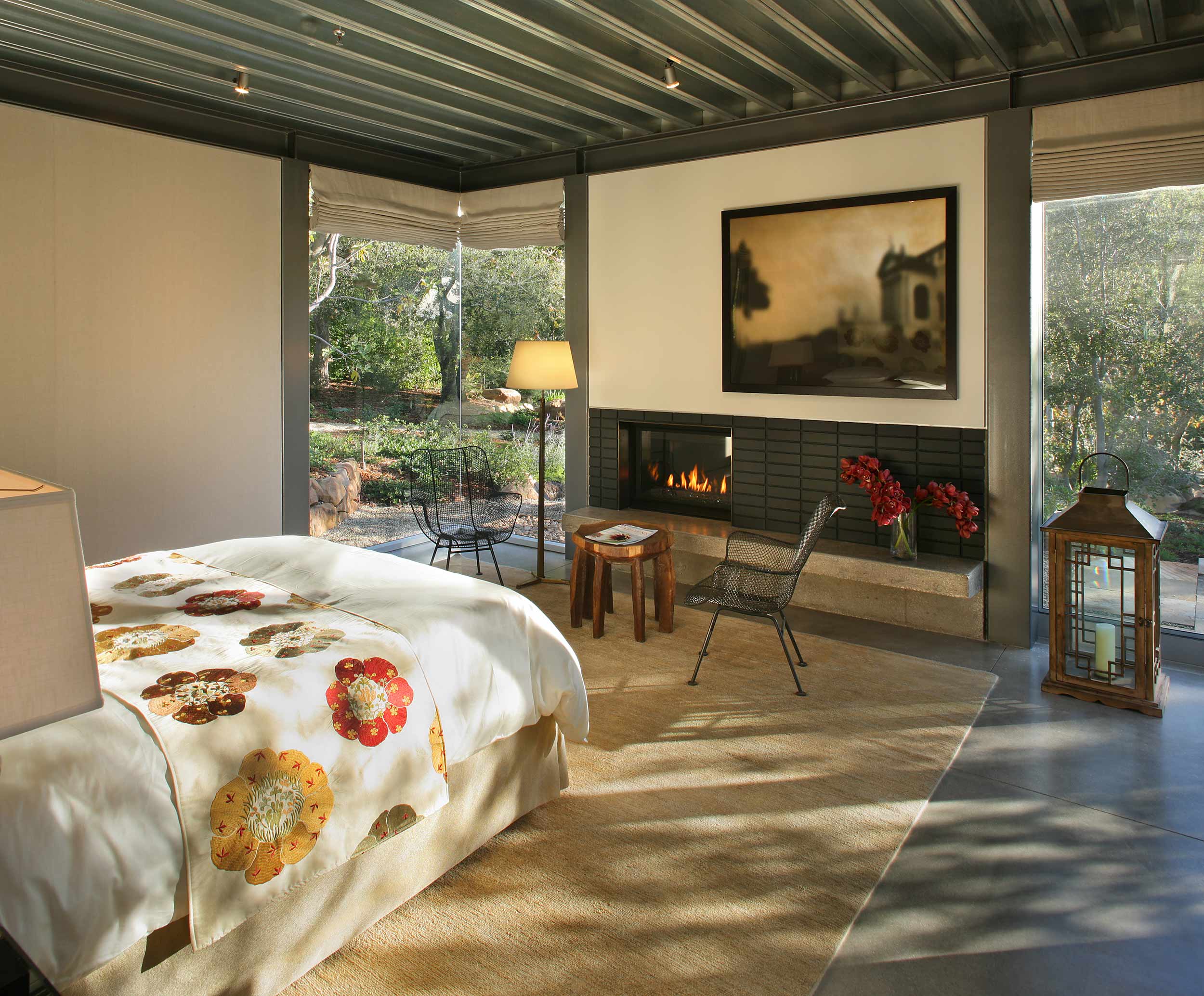 simple modern bedroom with patterned quilt