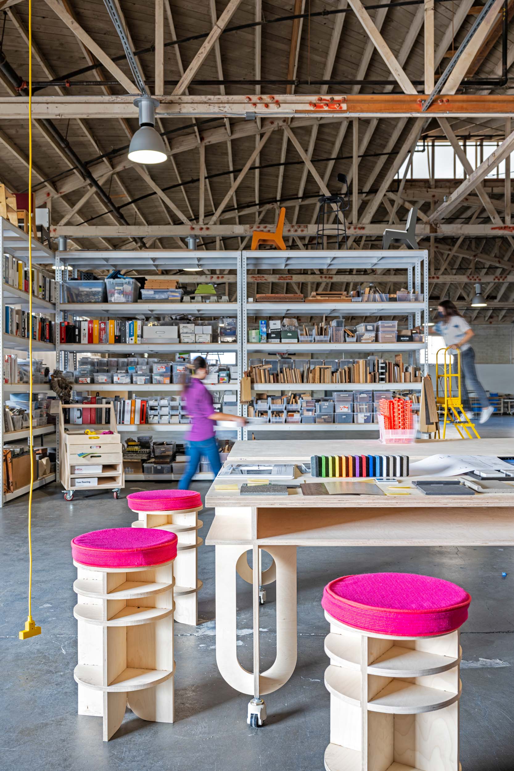 RIOS materials library with people pulling items from the shelf