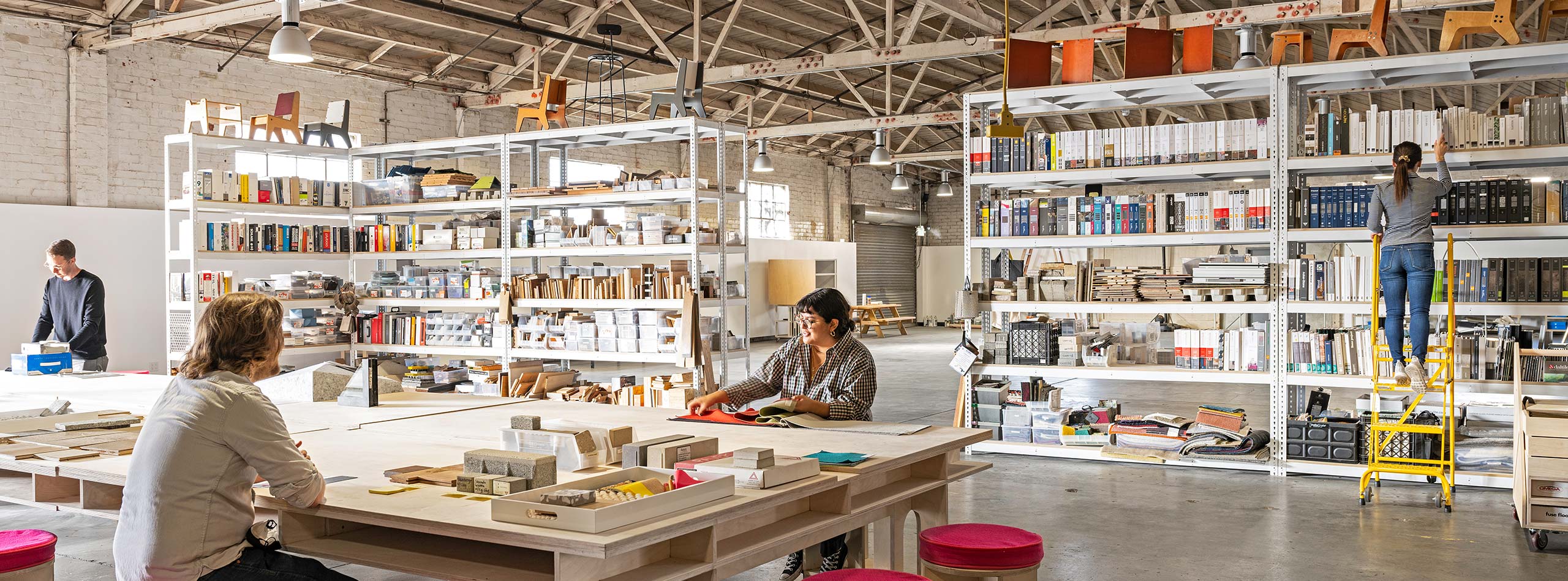 RIOS materials library with people seated at table