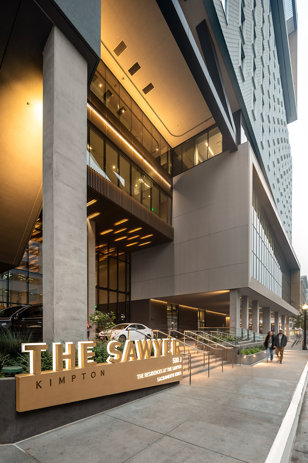 Kimpton hotel exterior entrance with large sign