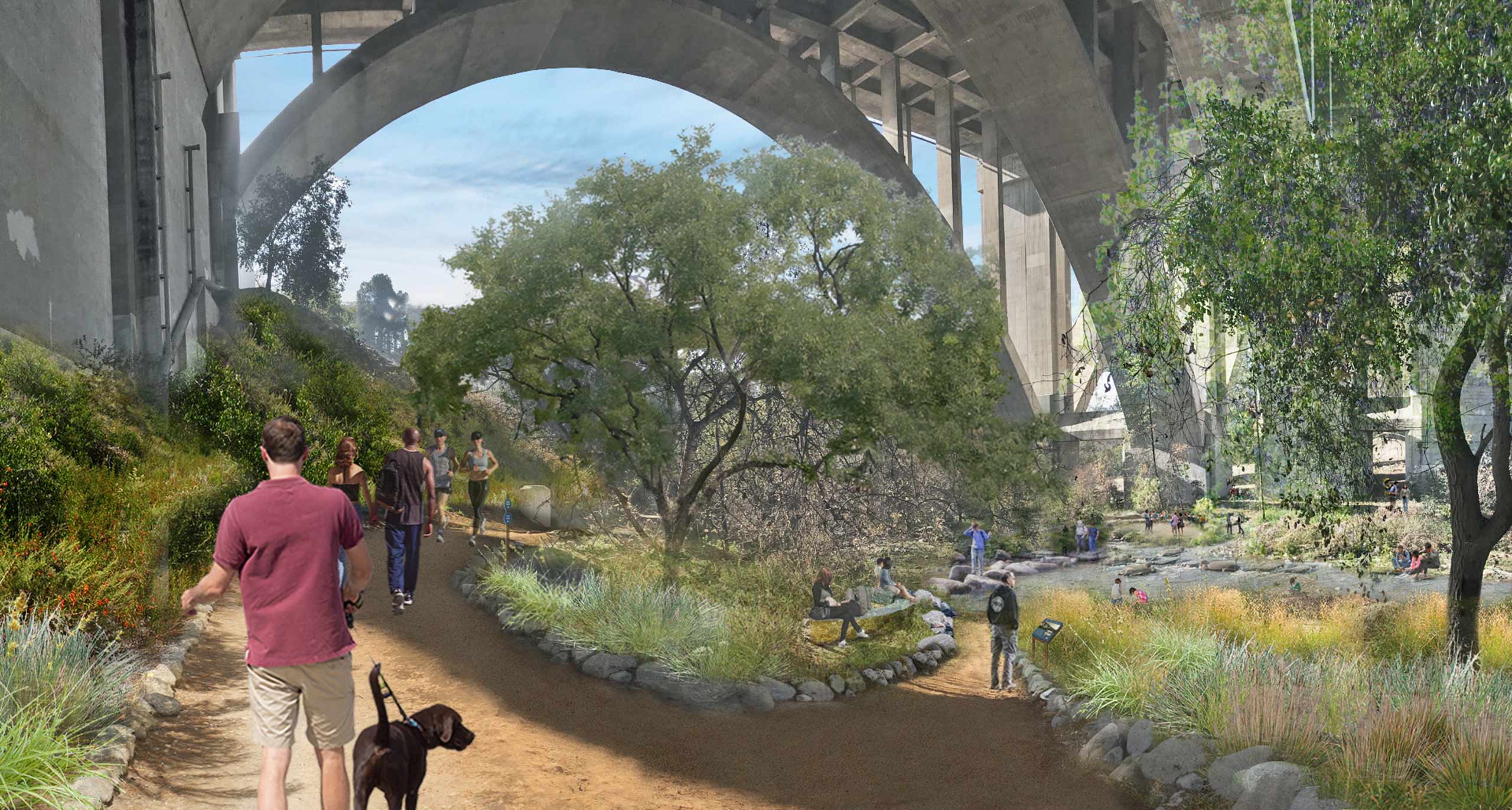 man walking his dog in the verdant areas underneath a bridge