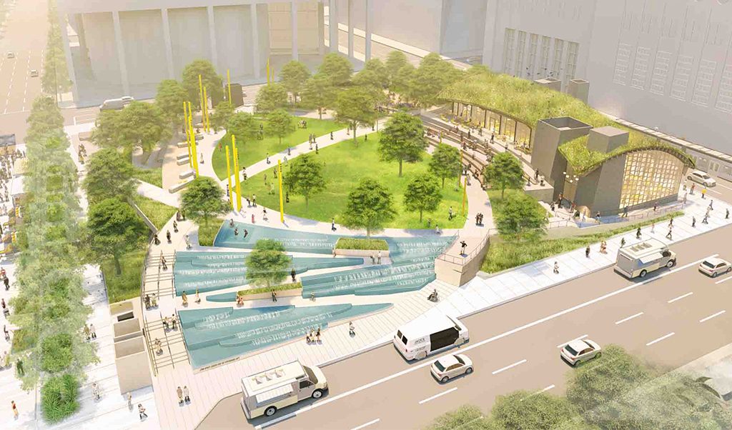 Aerial view of Lynn Wyatt square park with curved pathways, grass, trees, and a tiered fountain