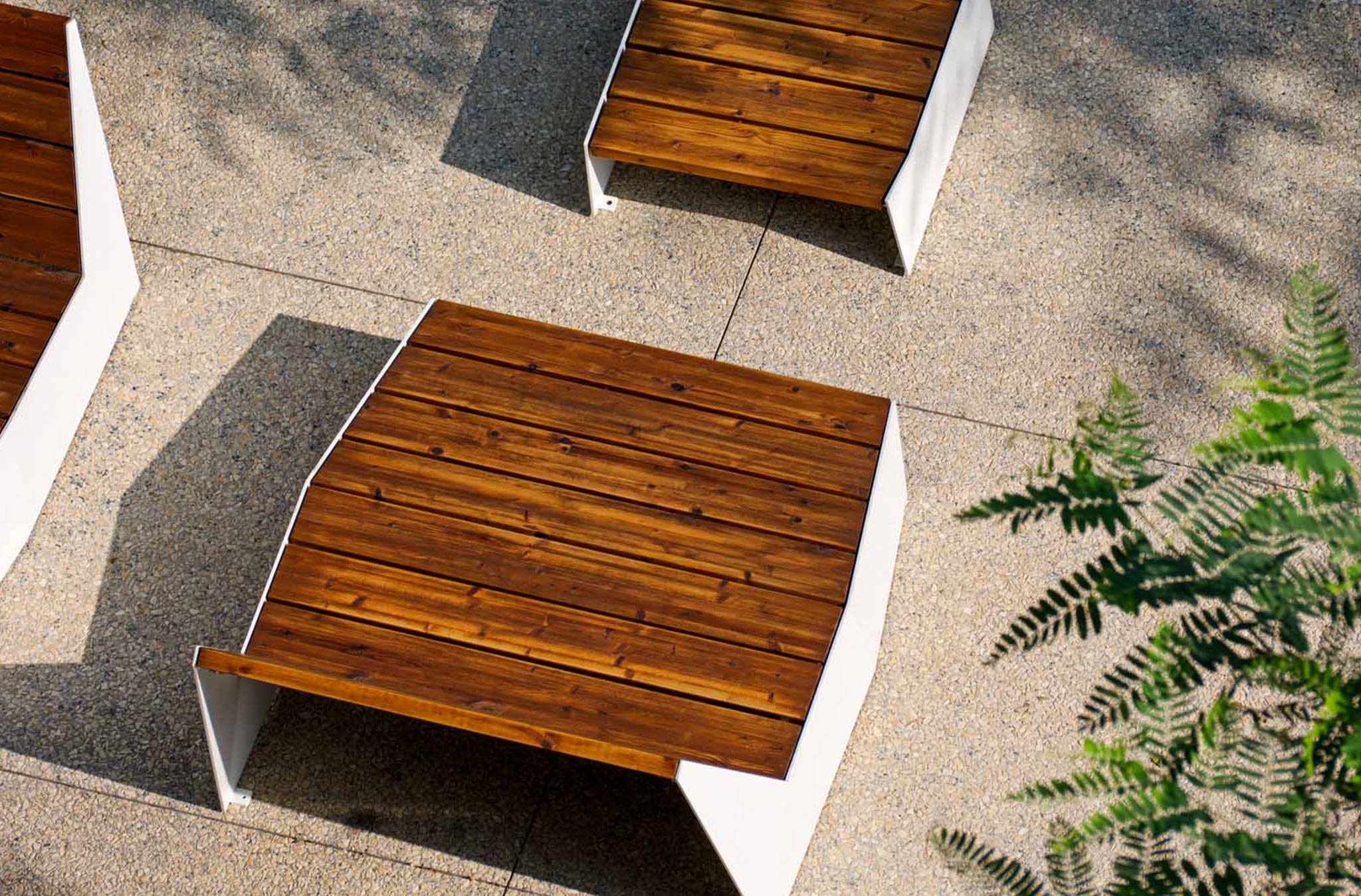 aerial close up of wooden furniture with white detailing