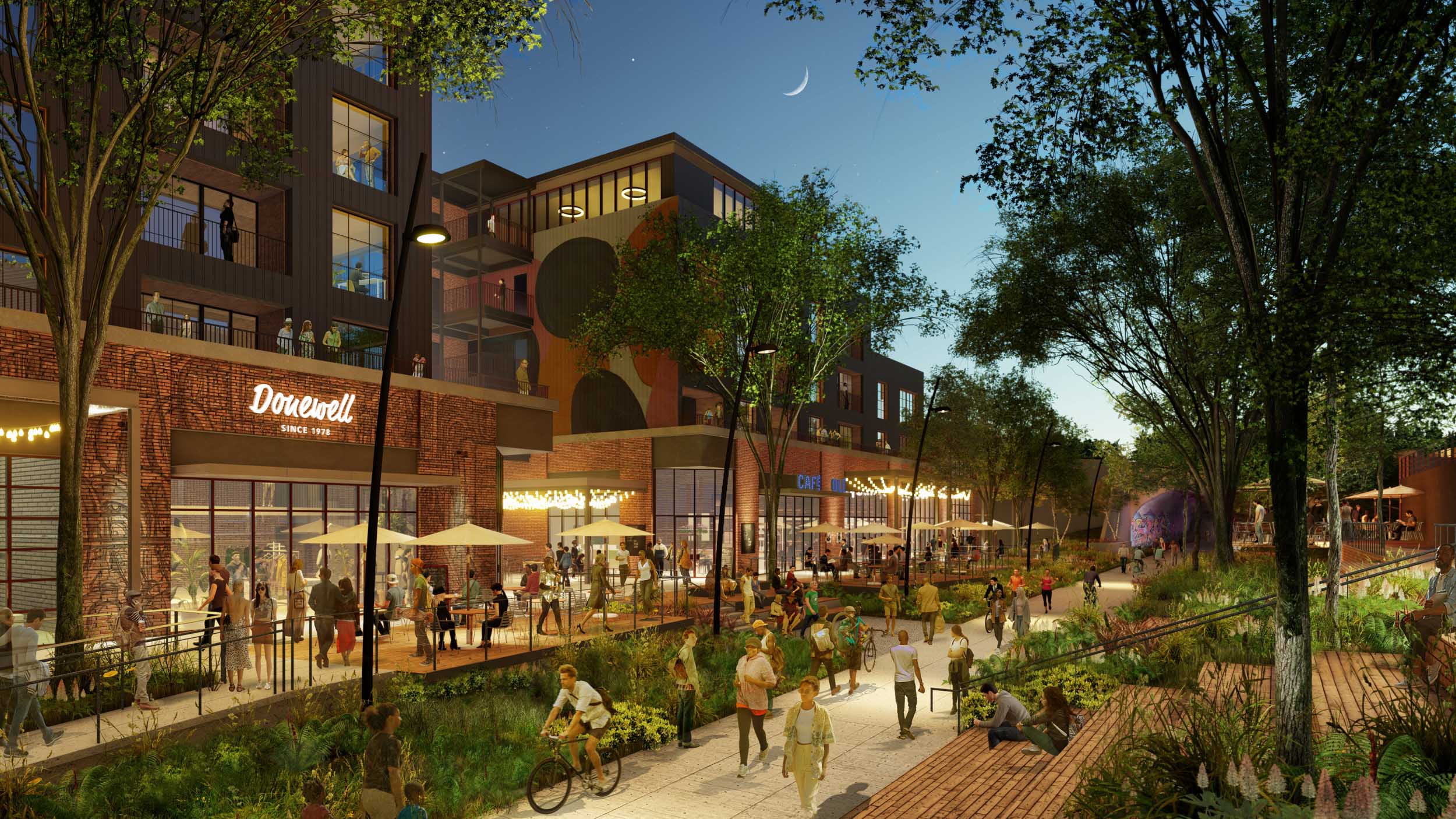 outside view of retail area with apartments on top, and a landscaped sidewalk in the foreground