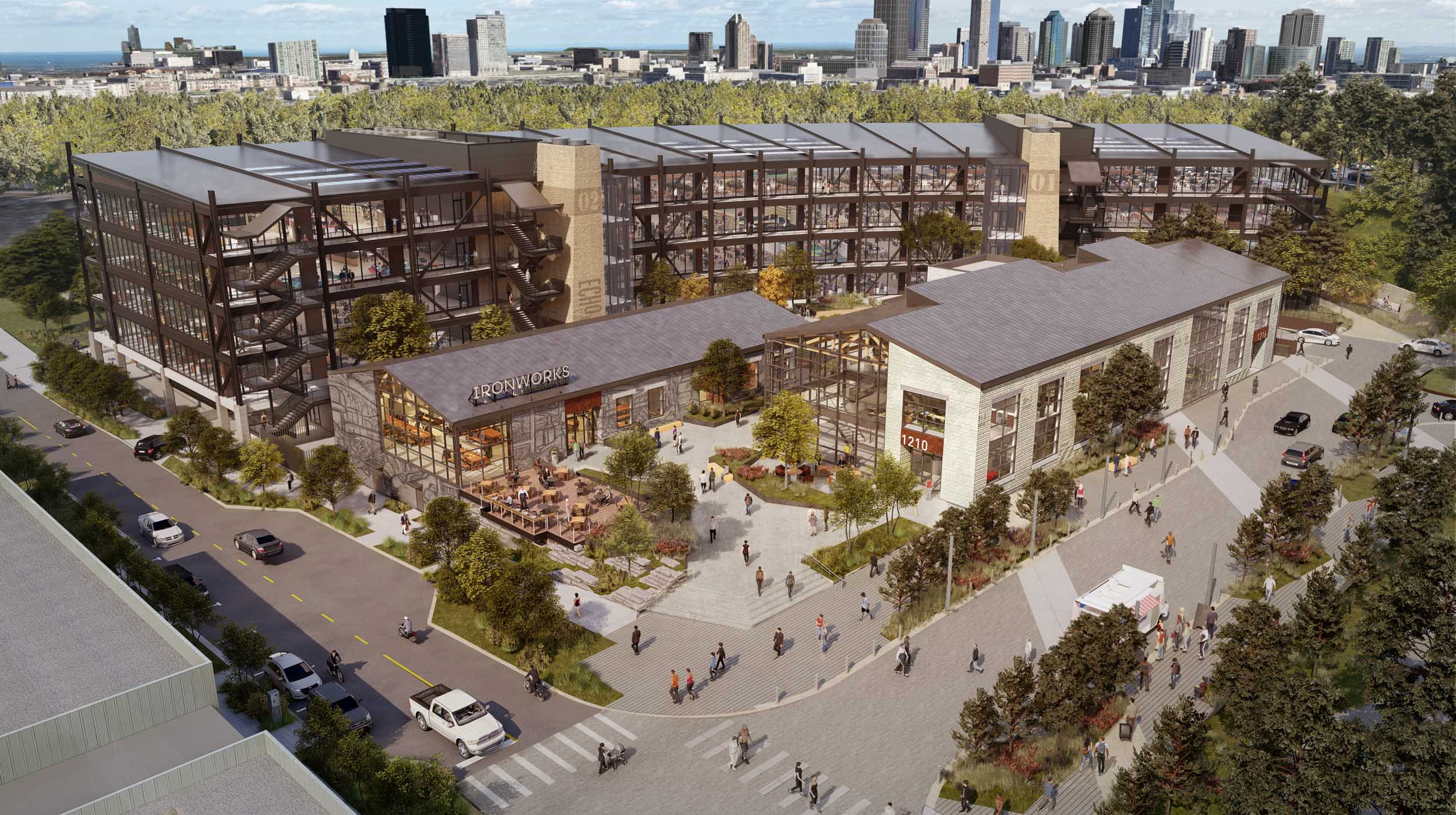 aerial view of mixed use complex with landscape