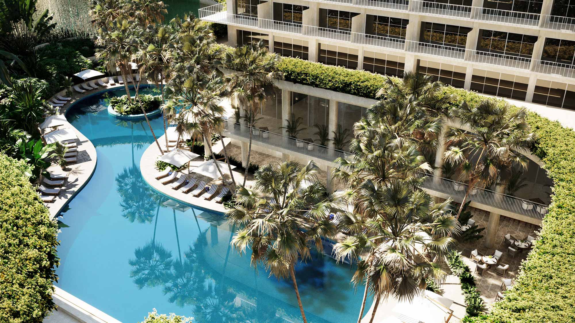 view of redesigned Beverly Hilton pool from upper level balcony