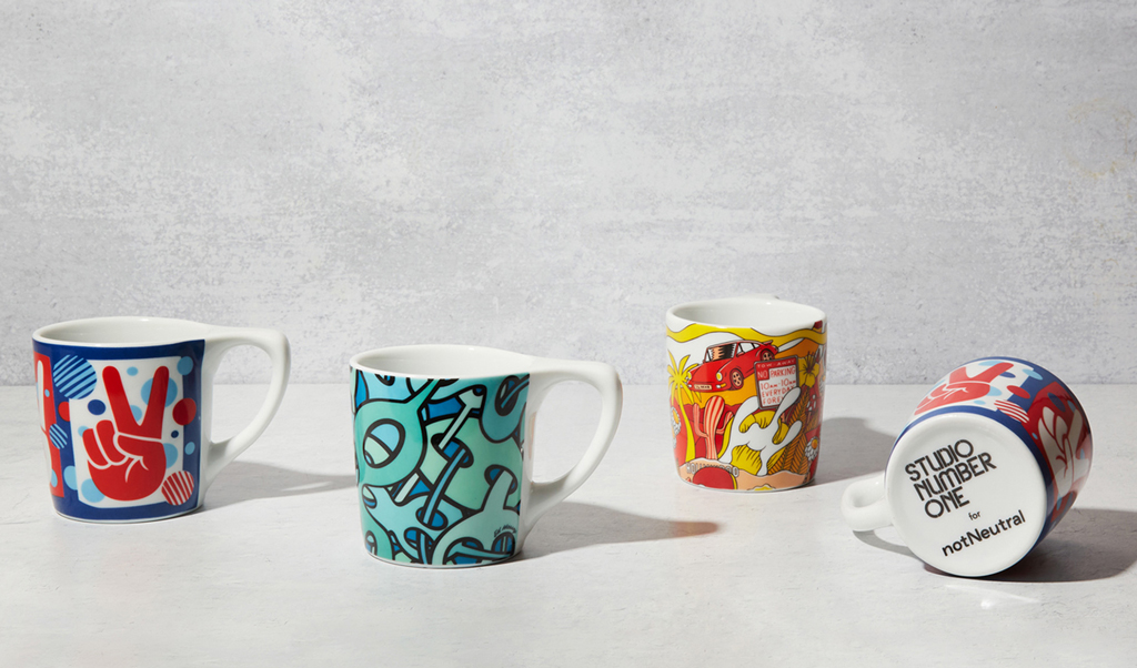 four colorful mugs from the NotNeutral artist series