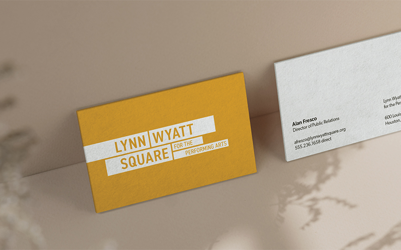 The front and back of business cards for Lynn Wyatt Square