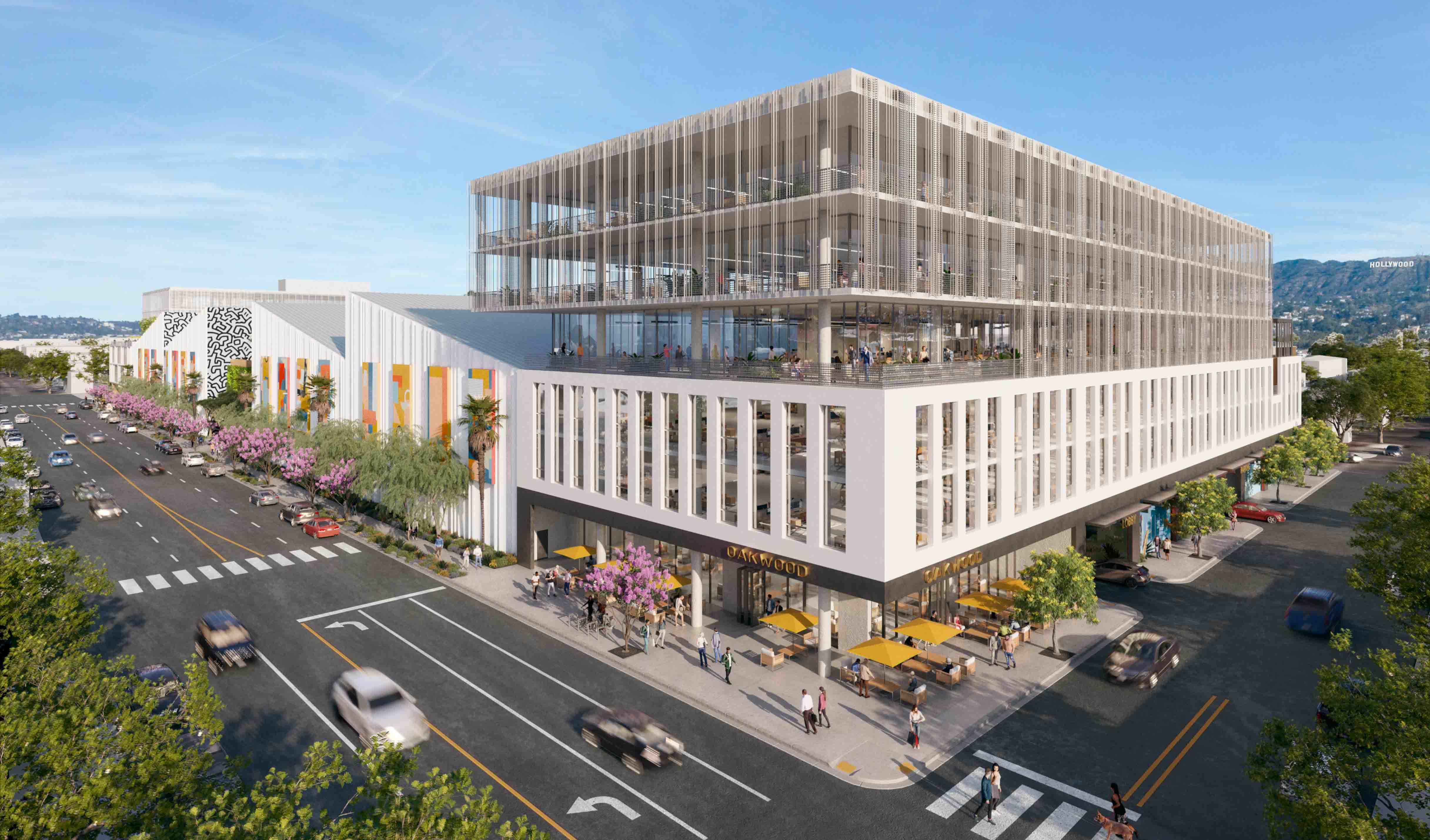 Corner street view of Echelon Studios with large windows and balconies