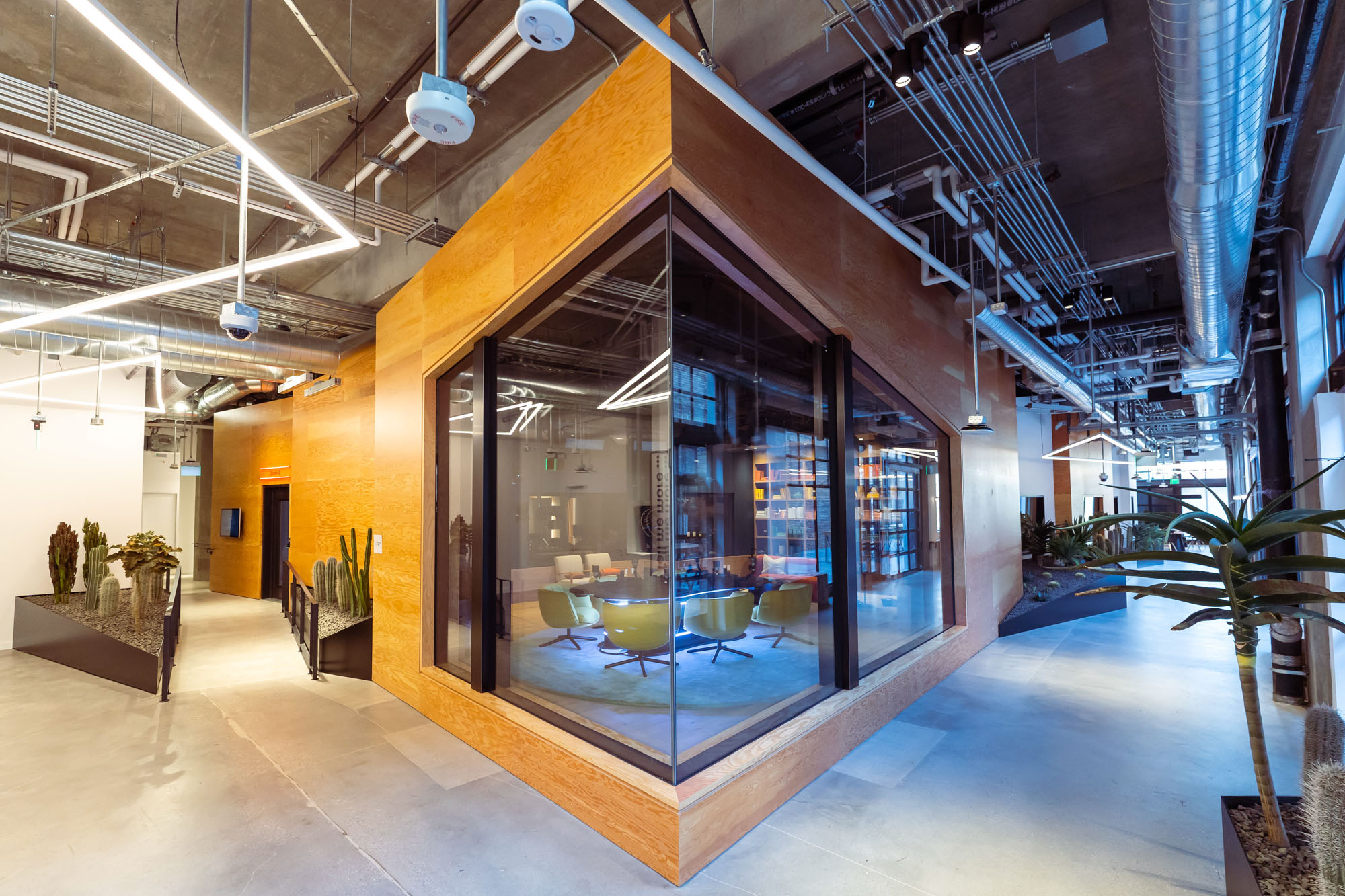 pod city recording room with a wood façade and large glass windows