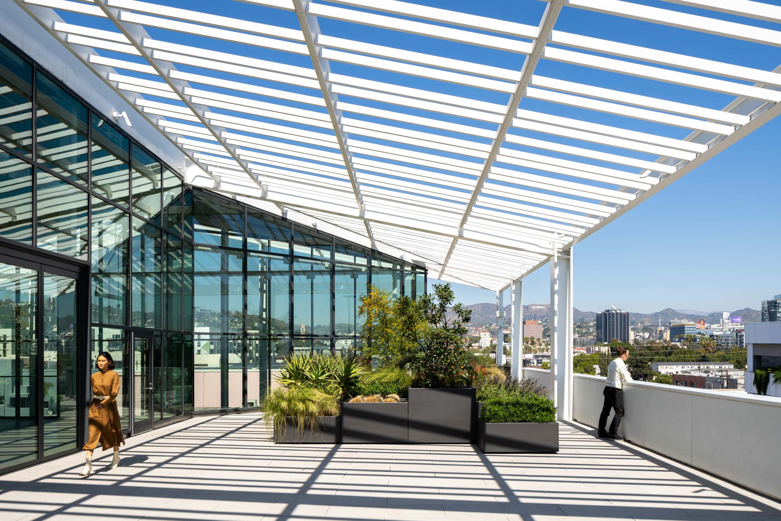 Outdoor patio with planters and views to the Hollywood Hills