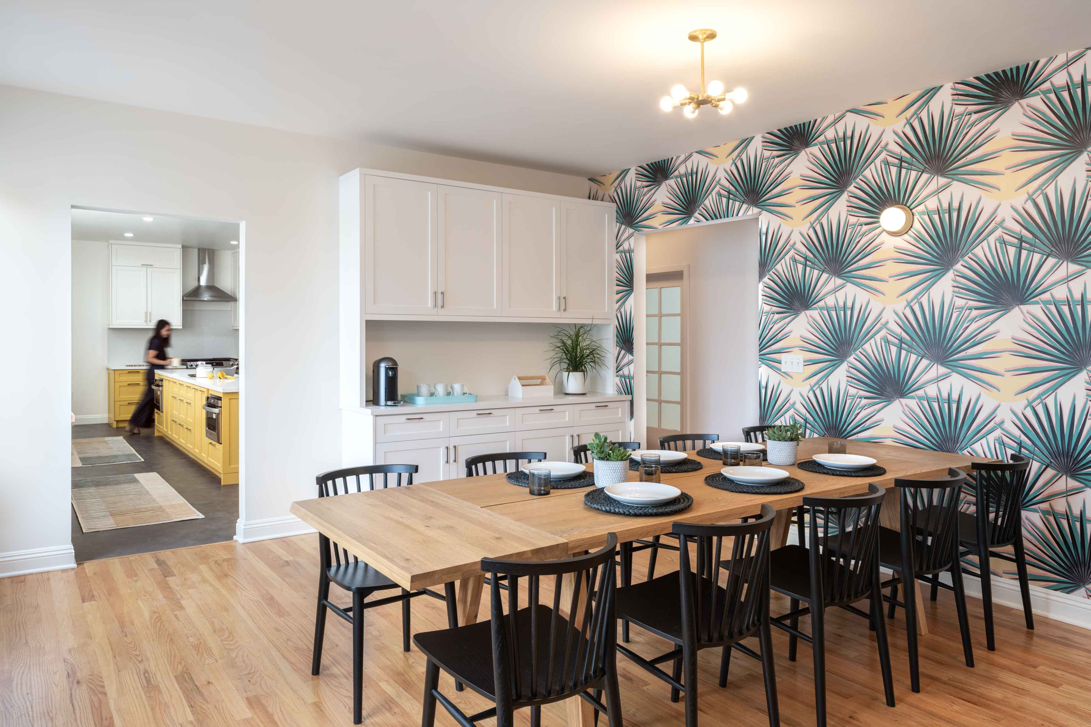 The dining room with funky wallpaper