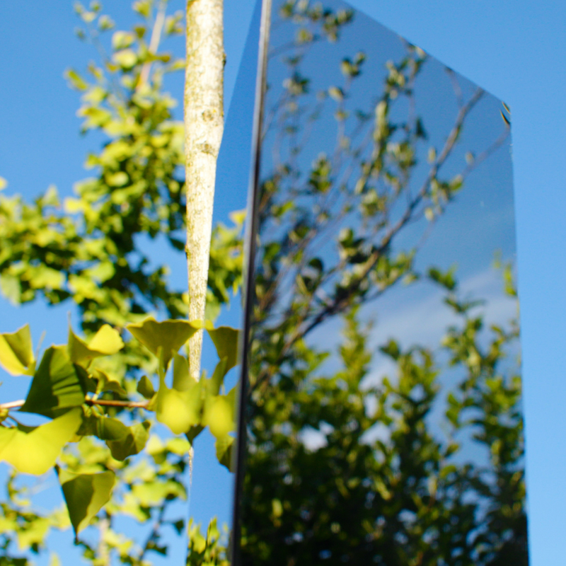 closeup detail of mirror totem at the Chaumont garden