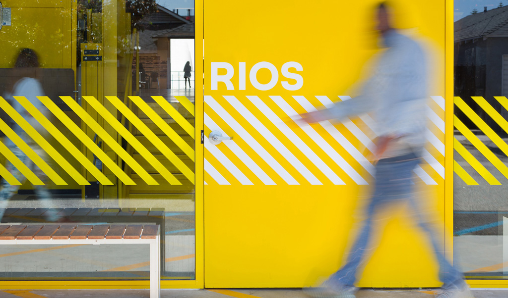 The front door of the RIOS LA Office with yellow door