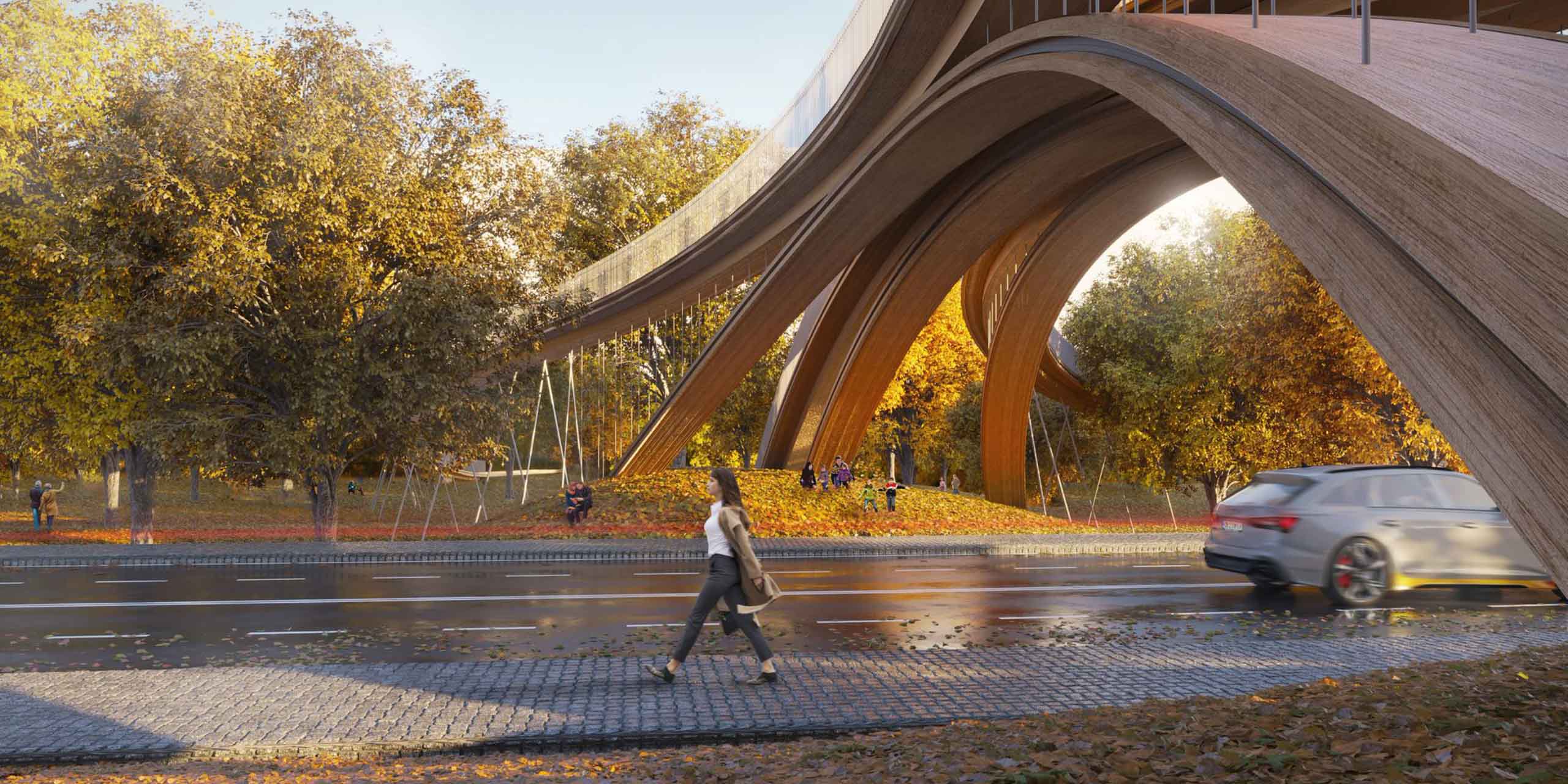 woman crossing under the bridge