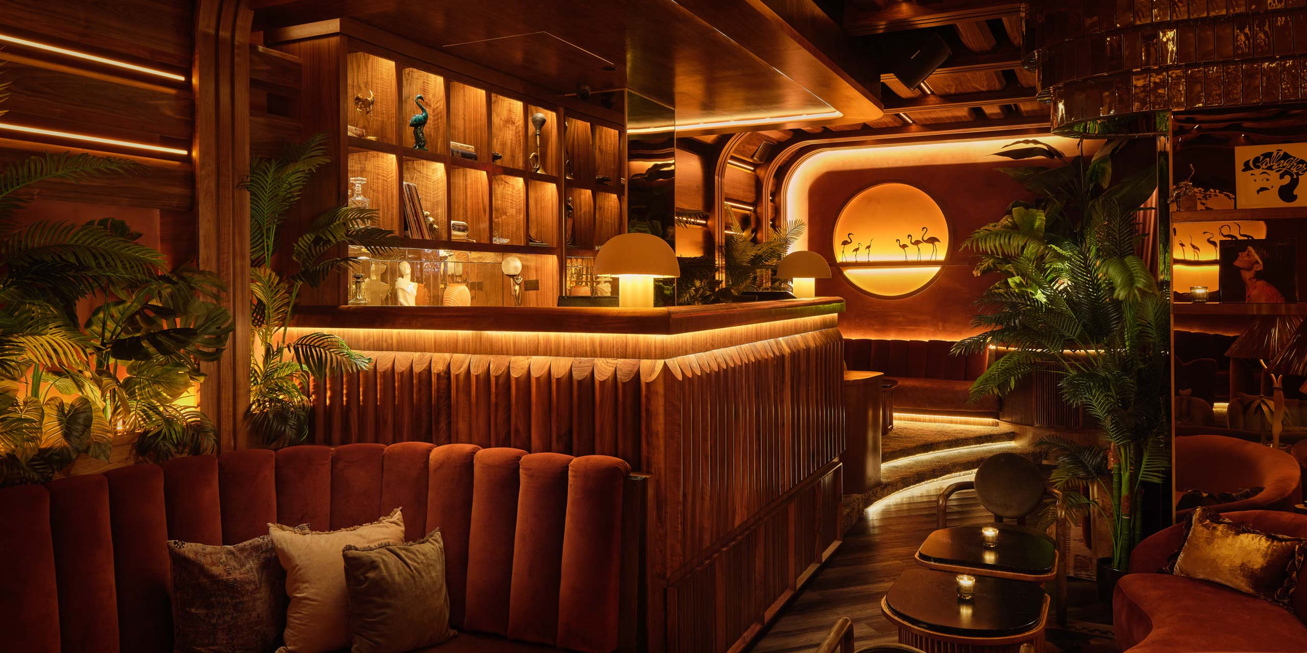 view of bar seating at Powder Room speakeasy