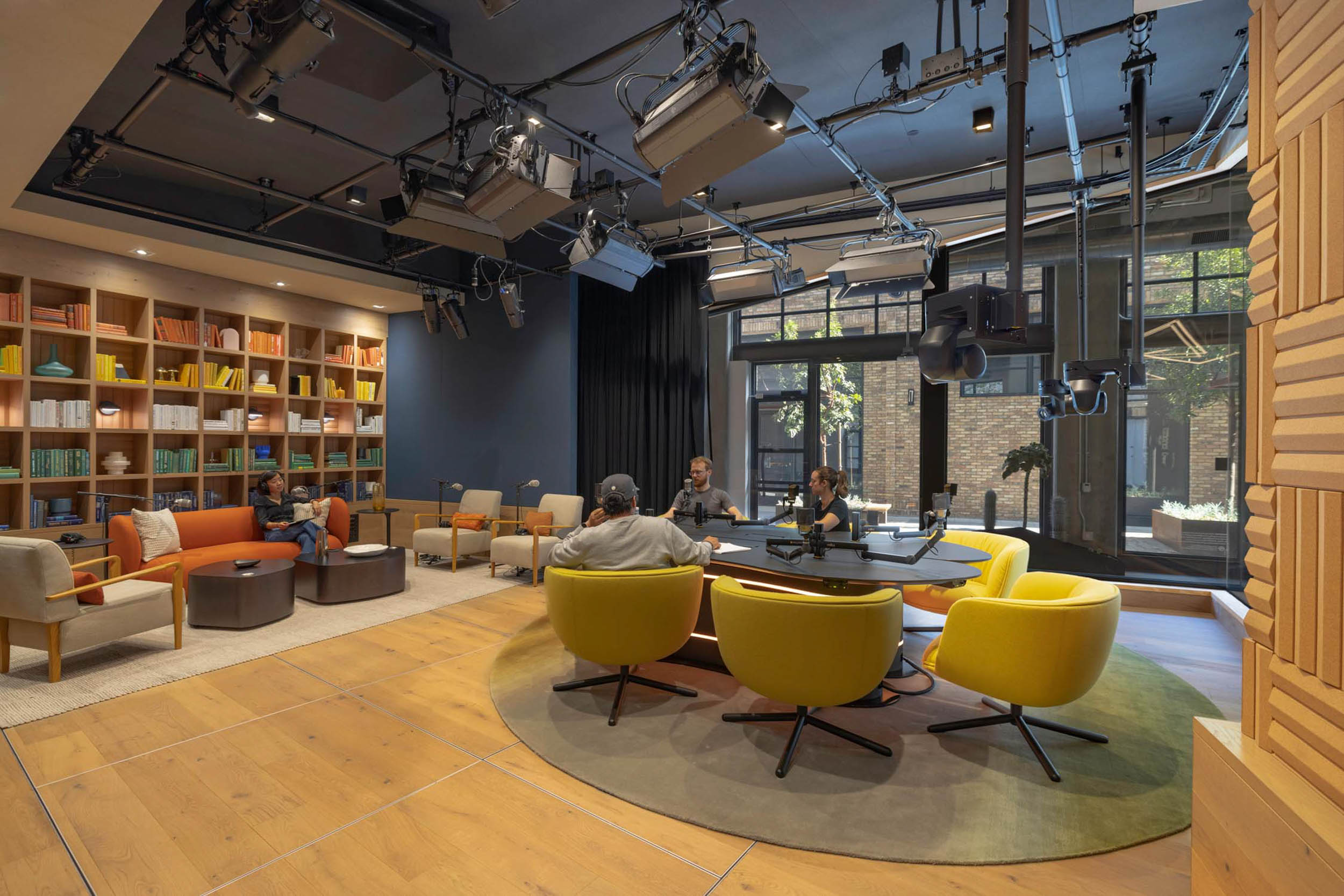 A recording and podcast studio at Spotify's Mateo campus balances production-ready infrastructure with the warmth of a lived-in creative space / content creation workplace