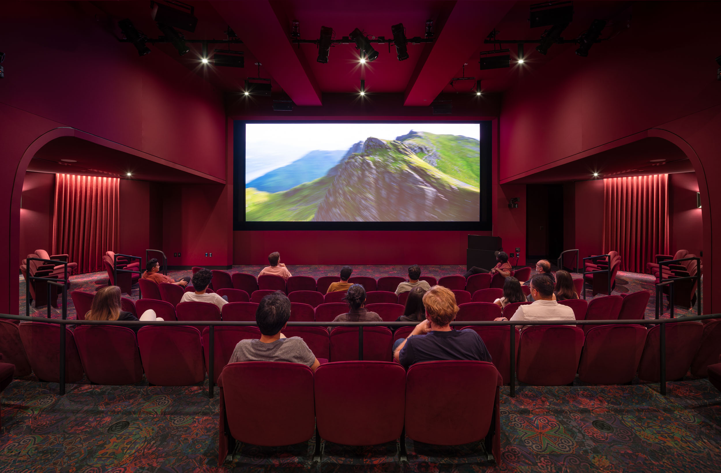A Dolby Atmos® and Dolby Vision® theater designed for broadcast-quality screening within the workplace / content creation workplace