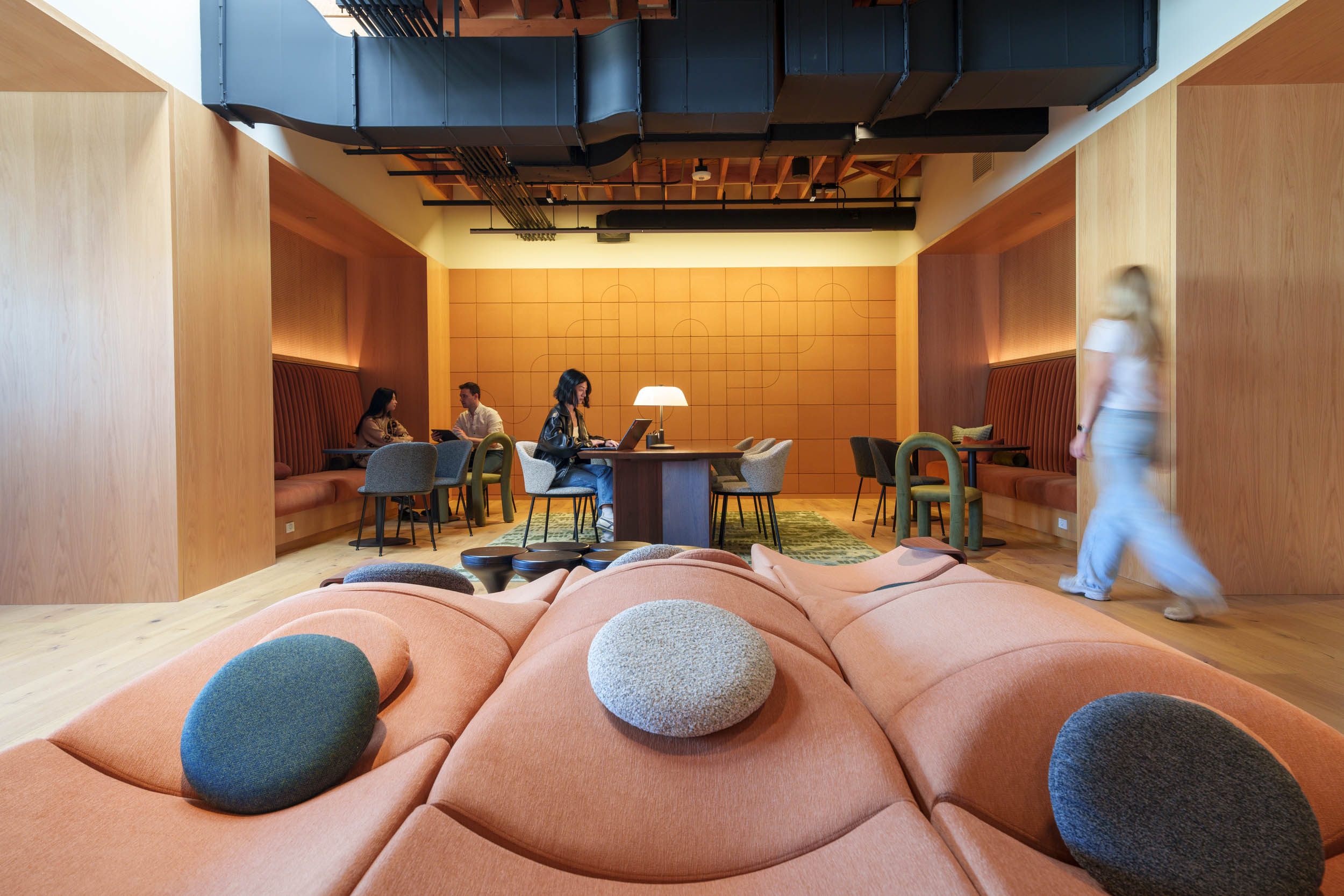 Warm materiality and flexible seating at Sony Music Publishing, a workplace designed to feel worth coming back to / content creation workplace